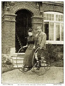 Dr and Mrs Conan Doyle on their tricycle outside their home in South Norwood, London