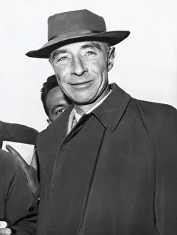 Prints of (Original Caption). Paris, France: Dr. J. Oppenheimer American physicist, photographed upon arrival at Orly Airport. He had come to lecture at the Paris Faculte de Sciences Pioneers of Science: Dr, Oppenheimer At Airport In Paris
