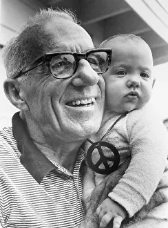 Dr. Spock Holding Baby