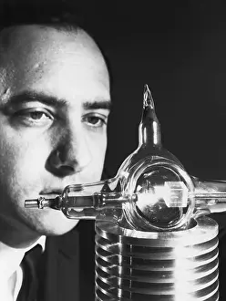 Inventor Prints: Dr. Theodore Maiman Looking at the Ruby Used to Create the First Laser Beam