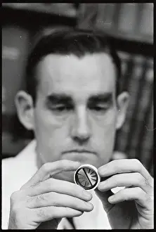 Madison Prints: Dr. Vincent Gott Holding Heart Valve
