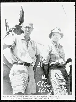 Dr. William Beebe and Otis Barton Leaning Against Bathysphere