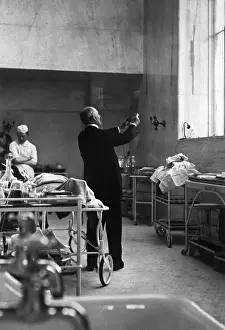 Laboratory Prints: Dr. William Halsted Looking at X-Ray