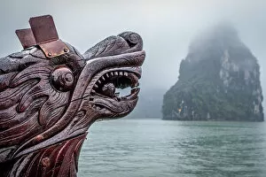 Images Dated 7th December 2011: Dragon head at bow of boat - Halong Bay, Vietnam