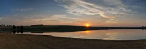 Dramatic panoramic sunset landscape photo over a peaceful remote and isolated farm lake. Kwazulu-Natal, South Africa Dramatic panoramic sunset landscape photo over a peaceful remote and isolated farm lake. Kwazulu-Natal, South Africa