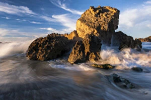 Dramatic seascape of Waves Crashing over Rocks on the beach at Kenton-On-Sea, Eastern Cape Province, South Africa