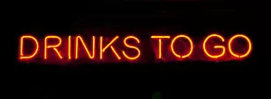 Images Dated 2nd November 2013: Drinks to go neon sign on a black background