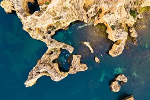 Amazing Drone Aerial Photography Gallery: Drone view of stand up paddlers among rocks, Portugal
