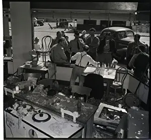 Broken Prints: Drug-Store Clerk Selling Soda Out Window