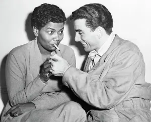 Fiancee Prints: Drummer Louis Bellson Lighting Pearl Bailey's Cigarette