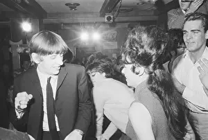 Twisting Prints: Drummer Ringo Starr Dancing the Twist at Nightclub