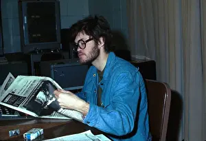 Prints of LOS ANGELES - 1969: Drummer and singer Mickey Dolenz of the Pop band The Monkees reads the newspaper in 1969 in Los Angeles. (Photo by Michael Ochs Archives/Getty Images) Hey Hey, It’s The Monkees: Prints Celebrating Pop’s Most Playful Phenomenon: Drummer and singer Mickey Dolenz of the Pop band The Monkees