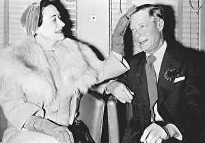 Duchess Of Windsor Adusts Duke's Hair
