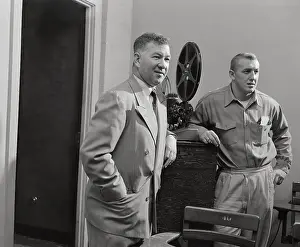Duffy Daugherty and Buck Nystrom Watching Game Films