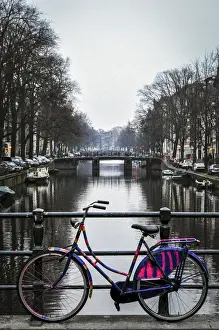Neder Prints: A Dutch Bicycle Parked on an Amsterdam Canal Bridge