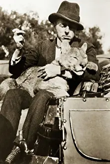 Griffith Prints: D.W. Griffith W/ His Pet Lion Cub