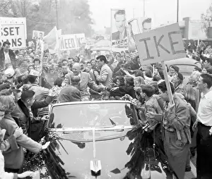 Dwight D. Eisenhower in Limousine and Surrounded by Supporters