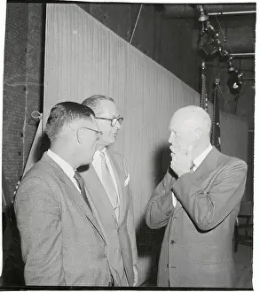 Dwight D. Eisenhower Pausing with His Communication's Specialist