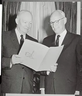 Dwight D. Eisenhower Reading Material with Businessman
