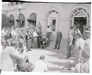 Dwight D. Eisenhower Standing in Front of Reporters at Outside Conference