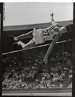 Dwight Eddleman Clearing High Jump Bar