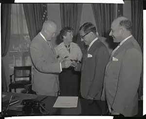 Dwight Eisenhower Handing Pen to Irving Berlin
