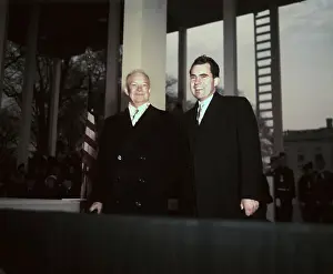 Dwight Eisenhower and Richard Nixon Standing on Balcony
