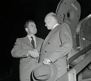 Prints of (Original Caption) A Presidency in Pictures: Dwight Eisenhower Shaking Hands with Richard Nixon