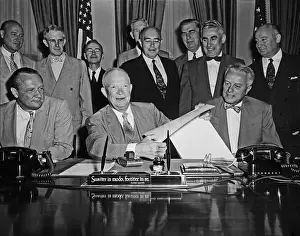 Dwight Eisenhower Surrounded by Energy Bill Participants at His Desk