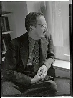 Dwight MacDonald Sitting and Looking Out Window