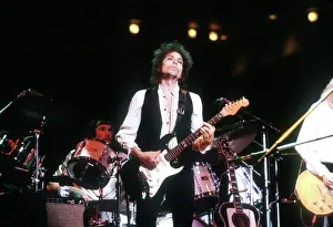 Prints of ATLANTA - DECEMBER 12: Bob Dylan performing onstage playing his Fender Stratocaster electric guitar and wearing a vest on December 12, 1978 at the Omni in Atlanta, Georgia Blowin' in the Wind: Bob Dylan's Photographic Legacy: Dylan Performs In Atlanta