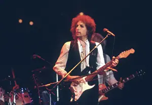 Prints of ATLANTA - DECEMBER 12: Bob Dylan performing onstage playing his Fender Stratocaster electric guitar and wearing a vest on December 12, 1978 at the Omni in Atlanta, Georgia Blowin' in the Wind: Bob Dylan's Photographic Legacy: Dylan Performs In Atlanta