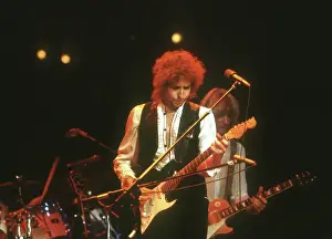 Prints of ATLANTA - DECEMBER 12: Bob Dylan performing onstage playing his Fender Stratocaster electric guitar and wearing a vest on December 12, 1978 at the Omni in Atlanta, Georgia Blowin' in the Wind: Bob Dylan's Photographic Legacy: Dylan Performs In Atlanta