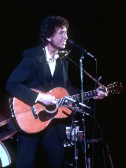 Dylan Plays Acoustic Guitar