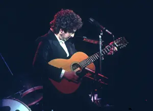 Dylan Plays Acoustic Guitar