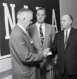 Exhibit Prints: E. Cavanagh Watches Men Exchange Money