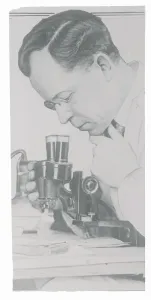 Berkeley Prints: E. O. Heinrich Gazing into Microscope