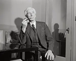 Earl Bertrand Russell Sitting and Smoking Pipe