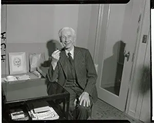 Earl Bertrand Russell Smiling and Holding Pipe