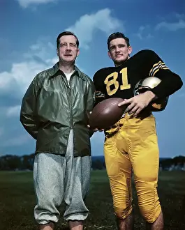 Earl Blaik and Dan Foldberg Posing with Football