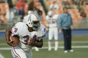 Earl Campbell Running with Football