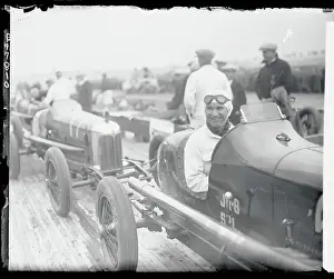 Salem Prints: Earl Cooper Sitting in a Race Car