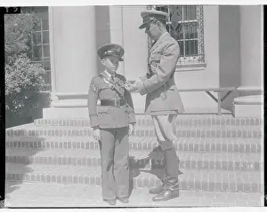 Earl Foxe Observing Medal on Young Cadet