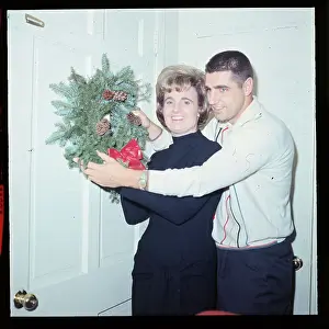 Norwalk Prints: Earl and Jane Morrall Hanging a Decoration