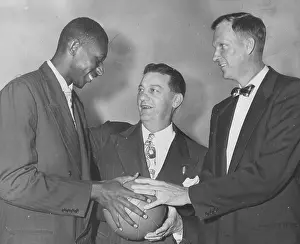 Prints of Basketball player Earl Lloyd (1928 - 2015), Jim Magner and Horace Kinley, October 20, 1950. (Photo by Afro American Newspapers/Gado/Getty Images) Courtside Vibes: Stunning Basketball Prints: Earl Lloyd, Jim Magner, Horace Kinley