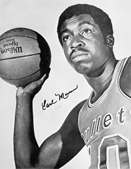Prints of A signed poster of Earl Monroe, basketball player with the Baltimore Bullets, holding a basketball, Baltimore, Maryland, 1970. (Photo by Afro American Newspapers/Gado/Getty Images) Courtside Vibes: Stunning Basketball Prints: Earl Monroe