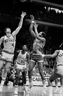 Prints of Earl Monroe of the New York Knicks guards Norm Van Lier of the Chicago Bulls in the 1974-1975 season at the Chicago Stadium in Chicago, Il. (Photo by Paul Natkin/Getty Images) Courtside Vibes: Stunning Basketball Prints: Earl Monroe of the New York Knicks guards Norm Van Lier of the Chicago Bulls in the 1974-1975 season at the Chicago