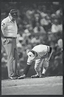 Earl Weaver Covering Home Plate with Dirt
