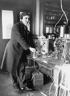 Electronic Prints: Early Radio Ham Operator Wearing Headpho
