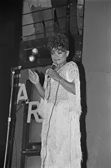 Prints of American singer and actress Eartha Kitt (1927 - 2008) performs at the Limelight in New York City, USA, circa 1987. (Photo by Michael Ochs Archives/Getty Images) Captivating Art Prints Celebrating the Iconic Performer’s Legacy: Eartha Kitt